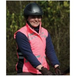 Weatherbeeta Adults Reflective Quilted Gilet Hi Vis Pink 1005273 Colour Pink -Equestrian Clothing Sales 1005273002 WB QLT GILET HIVIZ Lifestyle1 scaled e1621425405482.700x700