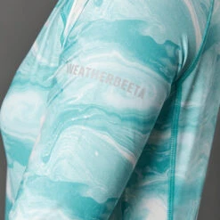 2022 Weatherbeeta Womens Ruby Printed Long Sleeve Top 1009342023 - Turquoise Swirl -Equestrian Clothing Sales 4511 1009342000 TURQUOISESWIRLMARBLEPRINT WB Ruby LS CU2 Image Null Hero.700x700